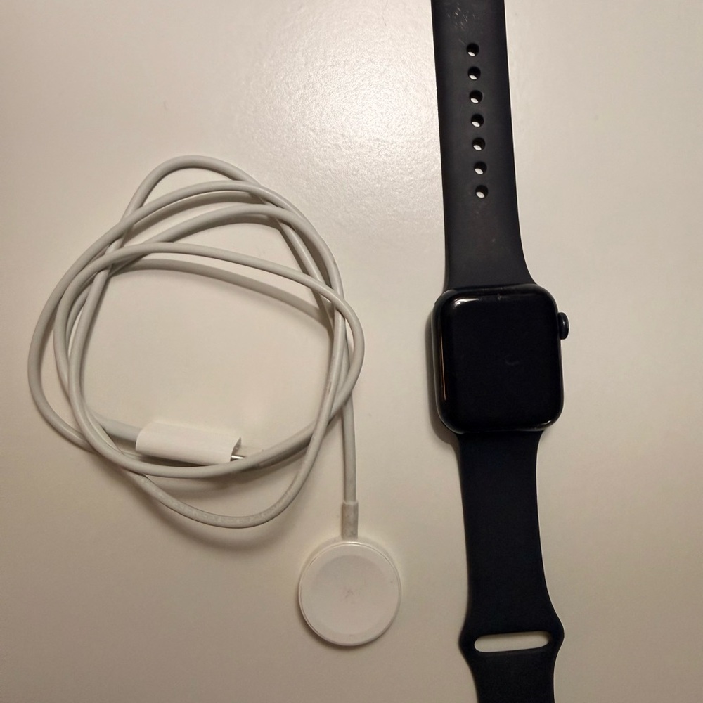 Apple Smartwatch in Black with White Charger